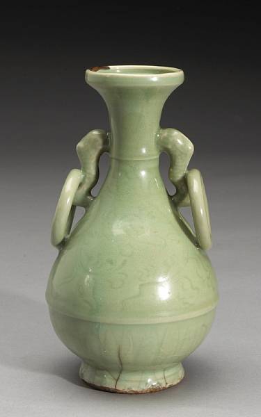 Appraisal: A Longquan celadon double-ring vase Ming Dynasty Of yuhuchun bottle