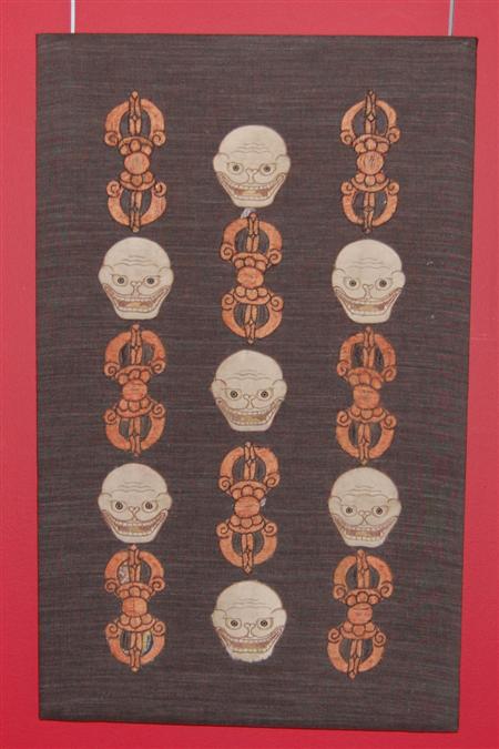 Appraisal: TIBETAN THANG-KA distemper on cloth decorated with three rows of