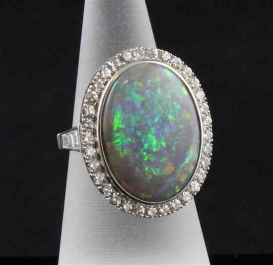 Appraisal: An ct white gold black opal and diamond set oval