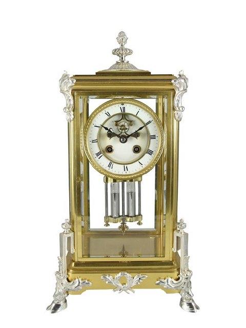 Appraisal: A gilt brass four-glass clock with plated mounts having a