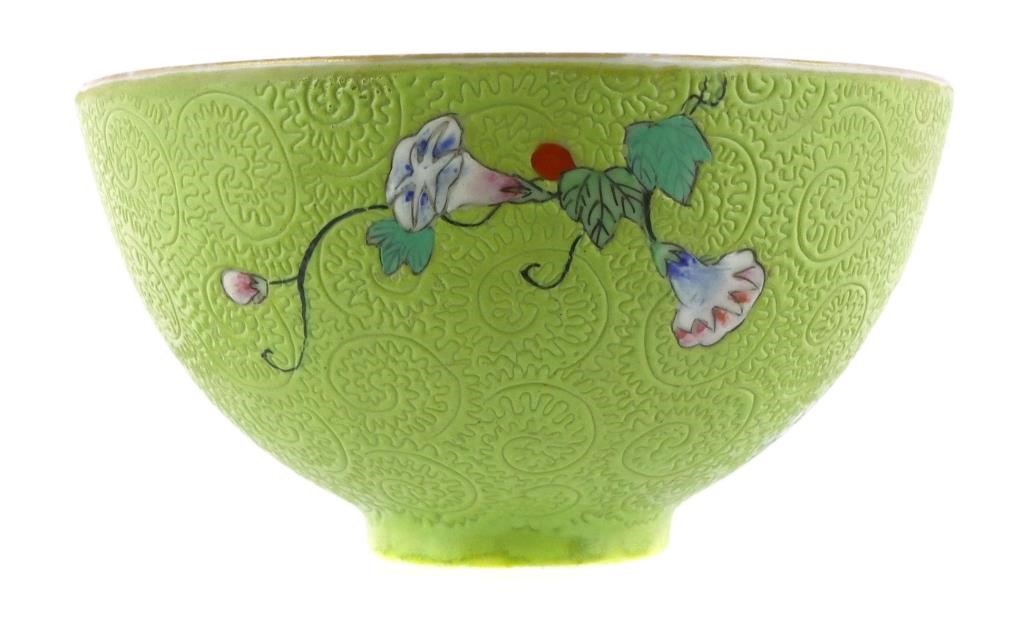 Appraisal: Antique Chinese bowl with floral motif on a chartreuse green