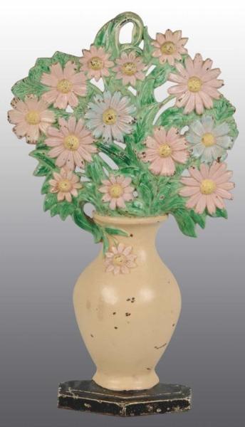 Appraisal: Cast Iron Cosmos Flowers Doorstop Description Made by Hubley cat