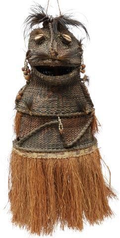 Appraisal: Large helmet mask possibly Papua New Guinea woven grass body