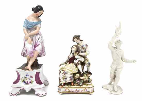 Appraisal: A Collection of Three Continental Porcelain Figures depicting a seated