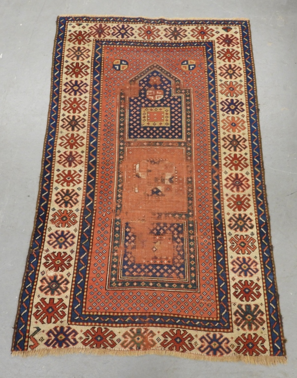 Appraisal: RUST RED BLUE KAZAK PRAYER RUG Middle East th CenturyRed