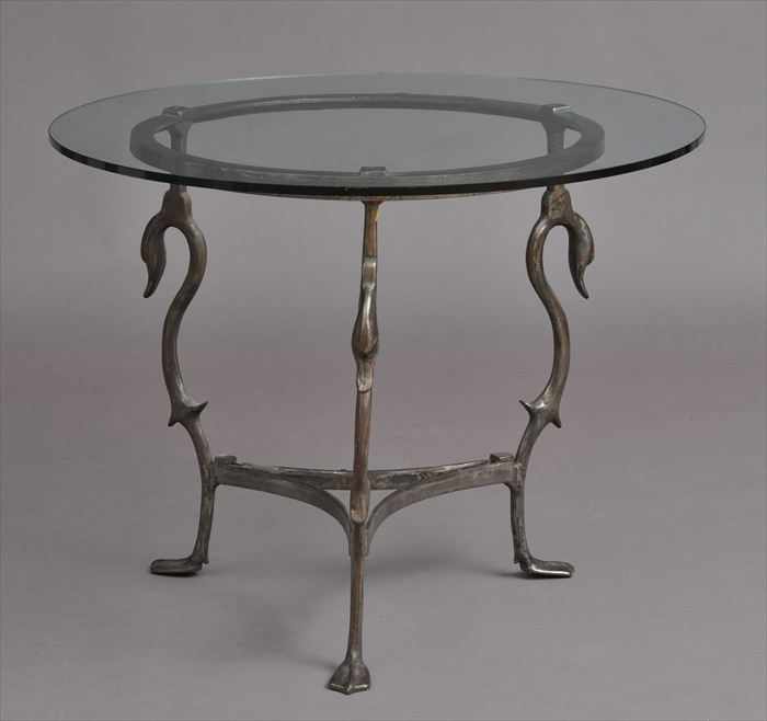 Appraisal: DIRECTOIRE-STYLE PATINATED METAL CENTER TABLE The round glass top over