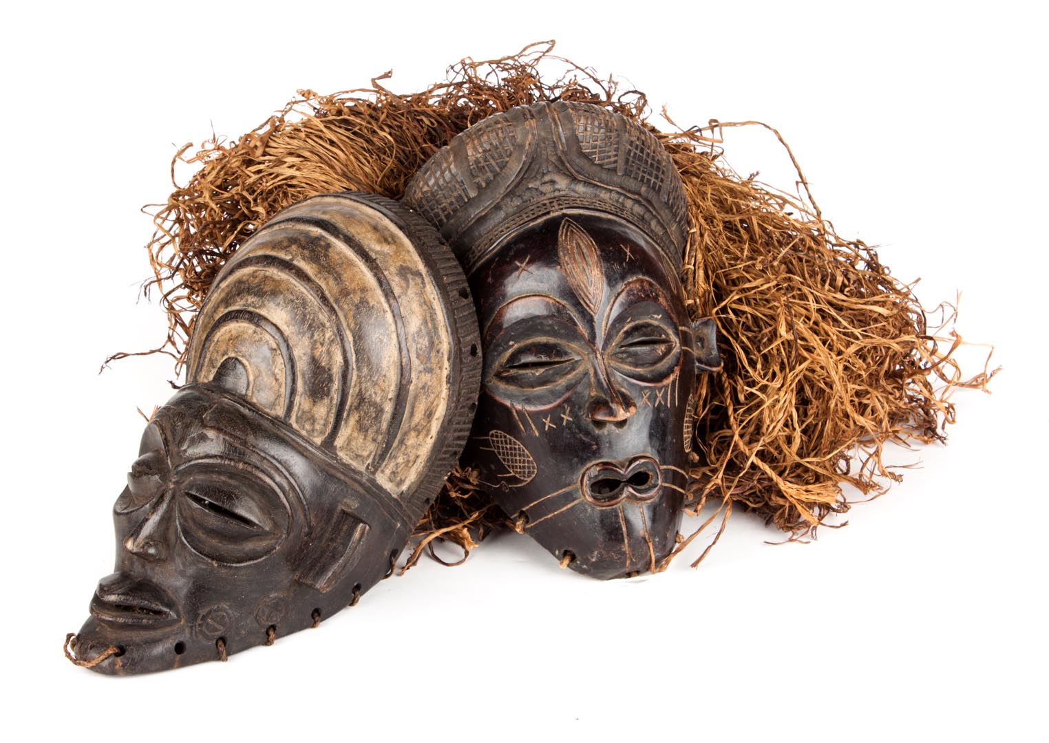 Appraisal: Two Chokwe masks with raffia hoods from Congo Kinshasa each