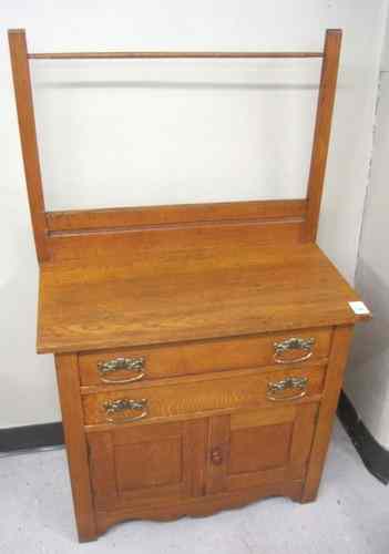 Appraisal: LATE VICTORIAN OAK COMMODE WASHSTAND American c the -drawer door