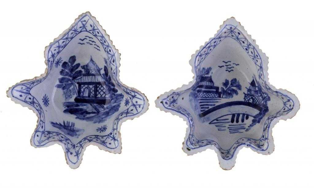 Appraisal: TWO DUTCH DELFTWARE PICKLE DISHES of vine leaf shape painted