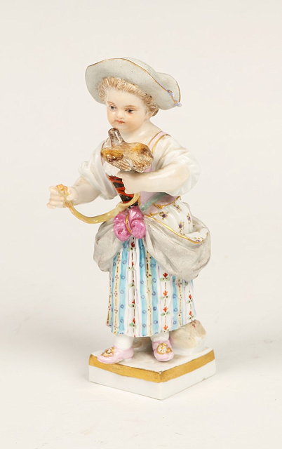 Appraisal: A MEISSEN PORCELAIN FIGURE of a girl holding a bird