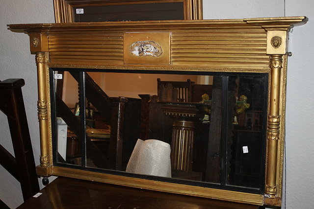 Appraisal: A REGENCY GILT OVERMANTEL THREE PART MIRROR with pillar and