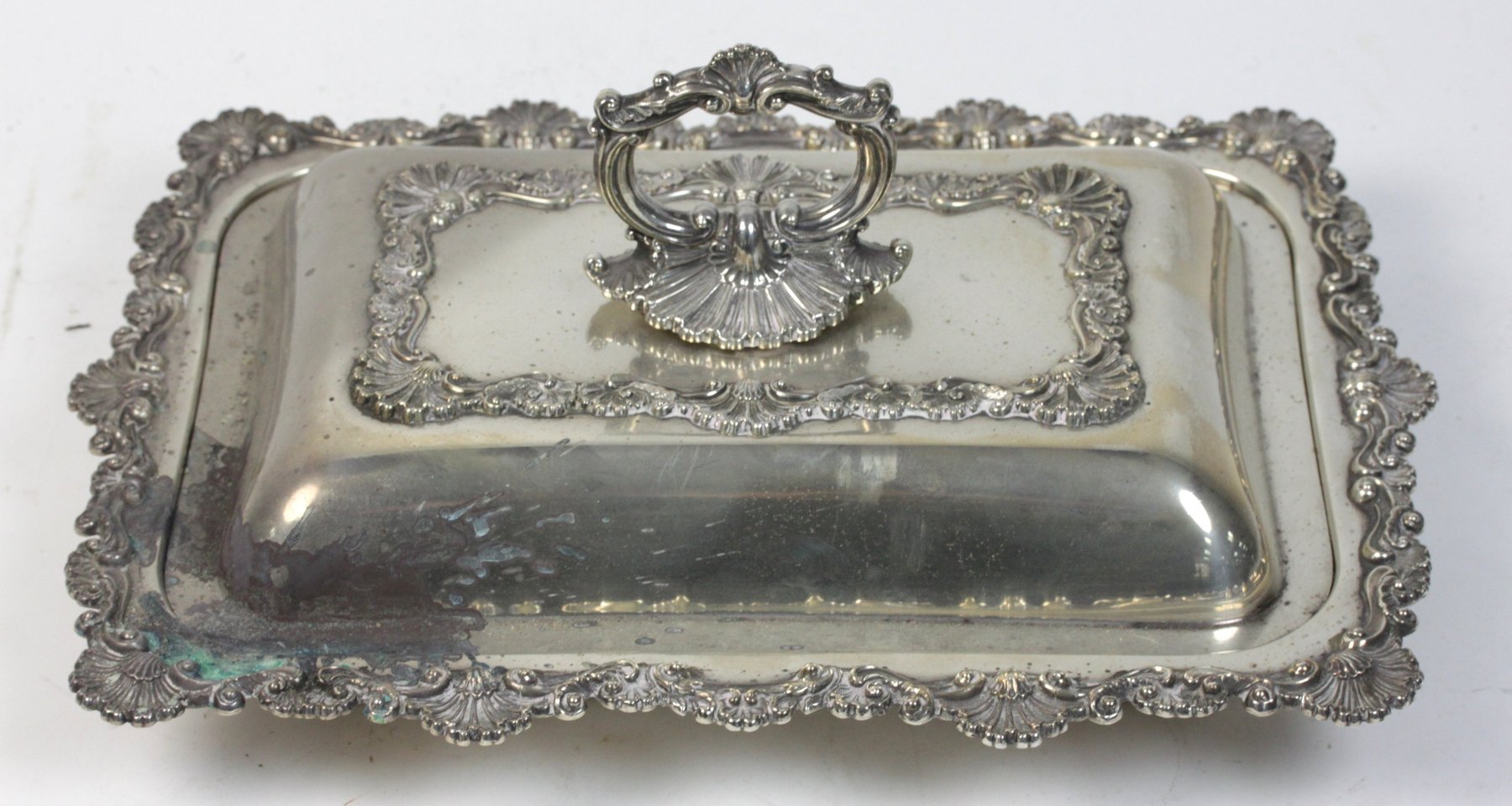 Appraisal: A rectangular silver entr e dish and cover Sheffield with