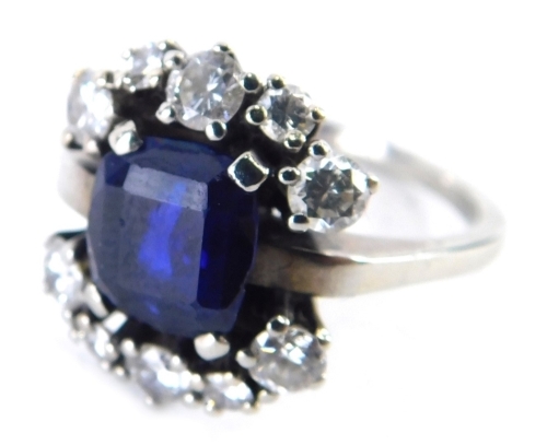 Appraisal: A sapphire and diamond dress ring rectangular cut sapphire in