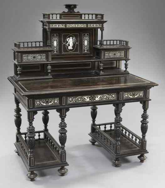 Appraisal: Italian ebonized wood and inlaid ivory deskhaving a galleried stepped