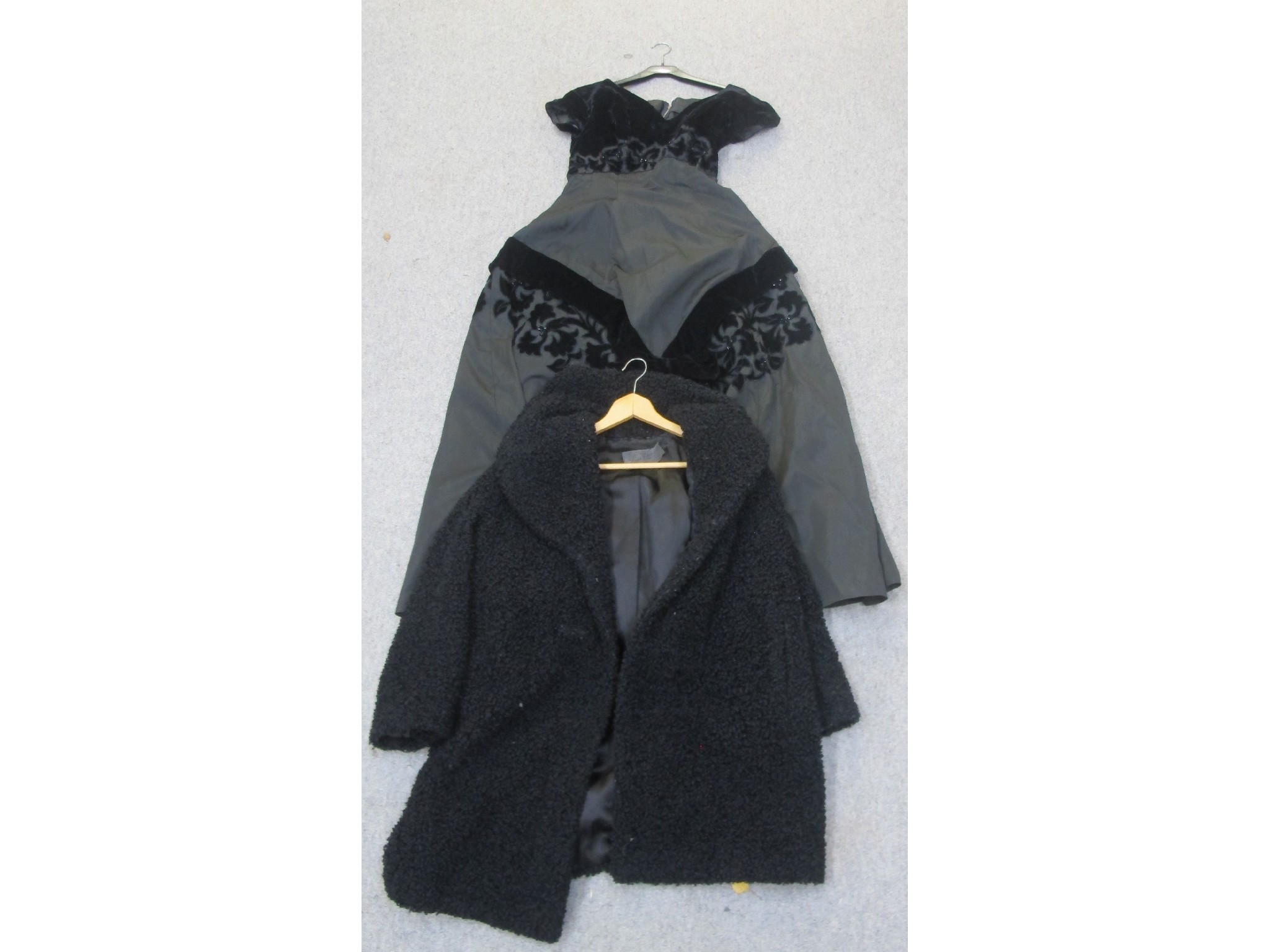 Appraisal: Black taffeta velvet and beaded dress together with a Leon