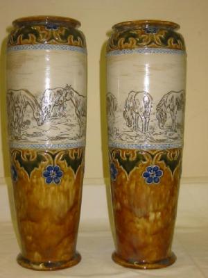 Appraisal: A PAIR OF DOULTON LAMBETH VASES by Hannah Barlow of