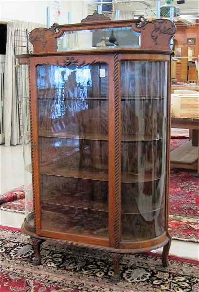 Appraisal: LATE VICTORIAN OAK AND CURVED GLASS CHINA CABINET American late