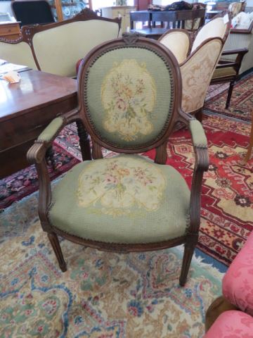 Appraisal: French Carved Walnut Needlepoint Chair medallion back