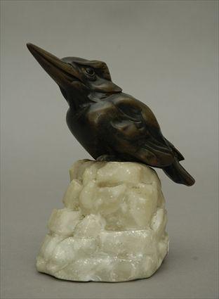 Appraisal: Continental School Kookaburra Perched on a Rock Bronze and alabaster