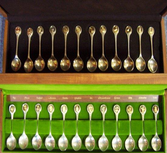 Appraisal: Twelve teaspoons with flower finials and twelve others with bird