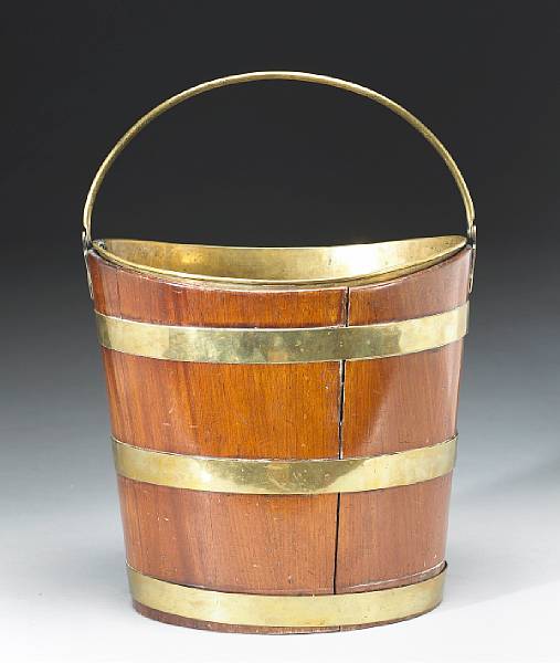 Appraisal: A George III mahogany and brass bucket last quarter th