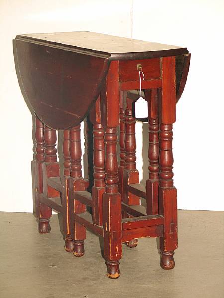 Appraisal: A William and Mary style stained pine gate leg table