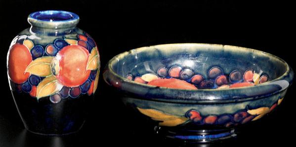 Appraisal: MOORCROFT Vase and bowl in the Pomegranate pattern on indigo