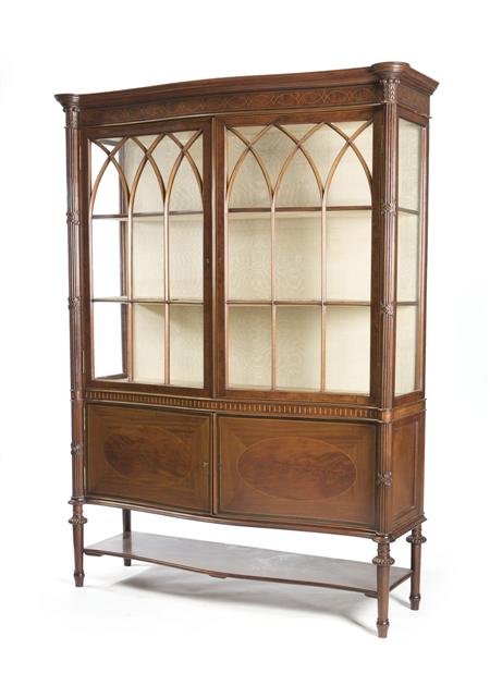 Appraisal: A good Edwardian mahogany and inlaid serpentine display cabinet circa