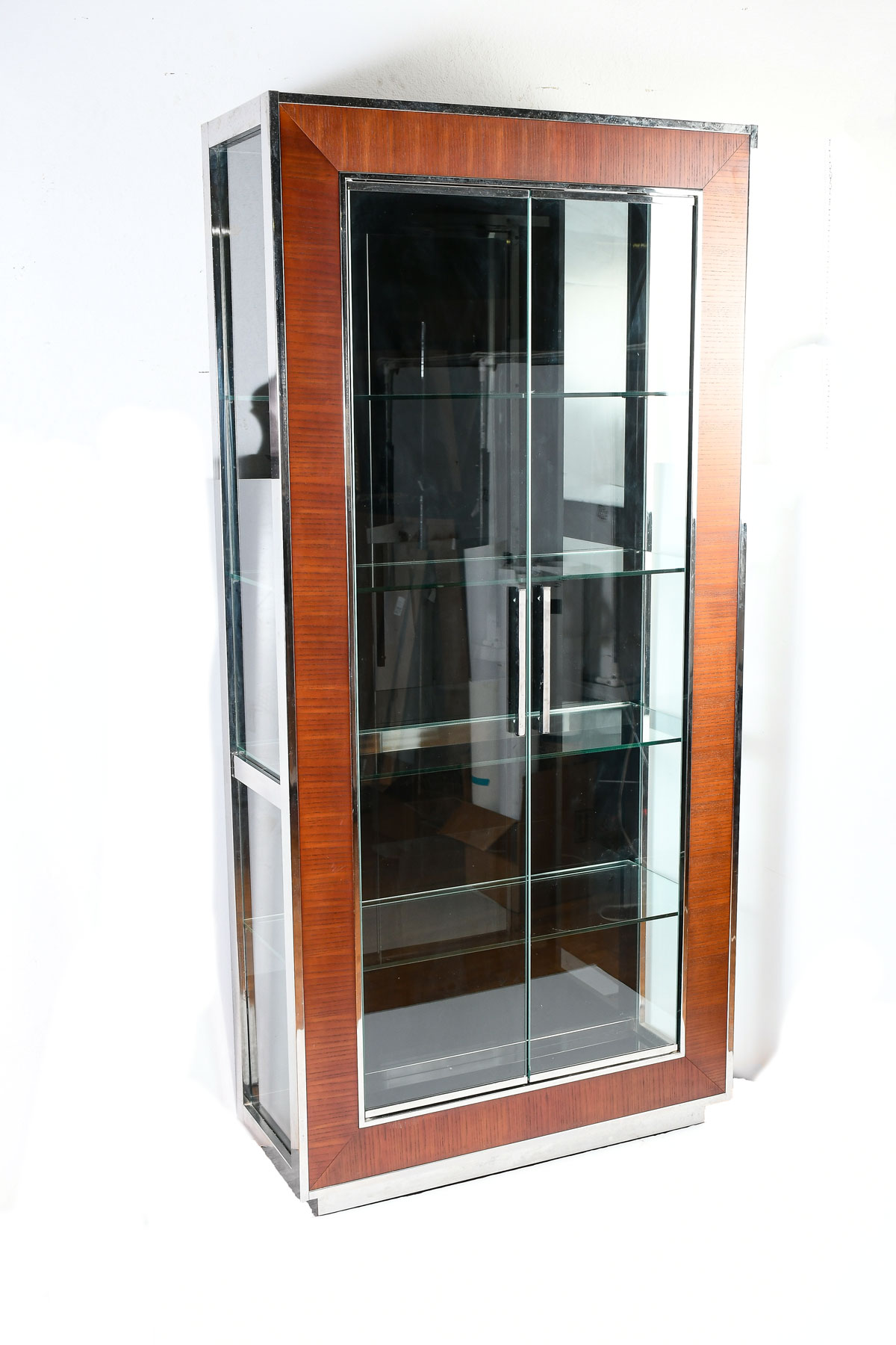 Appraisal: MODERN GLASS DISPLAY Modern chrome framed glass display cabinet with