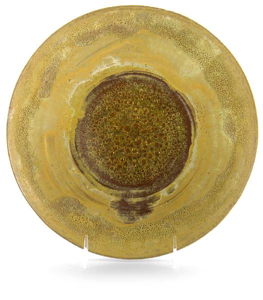 Appraisal: Property of various owners Shallow Bowl yellow volcanic glazed earthenware