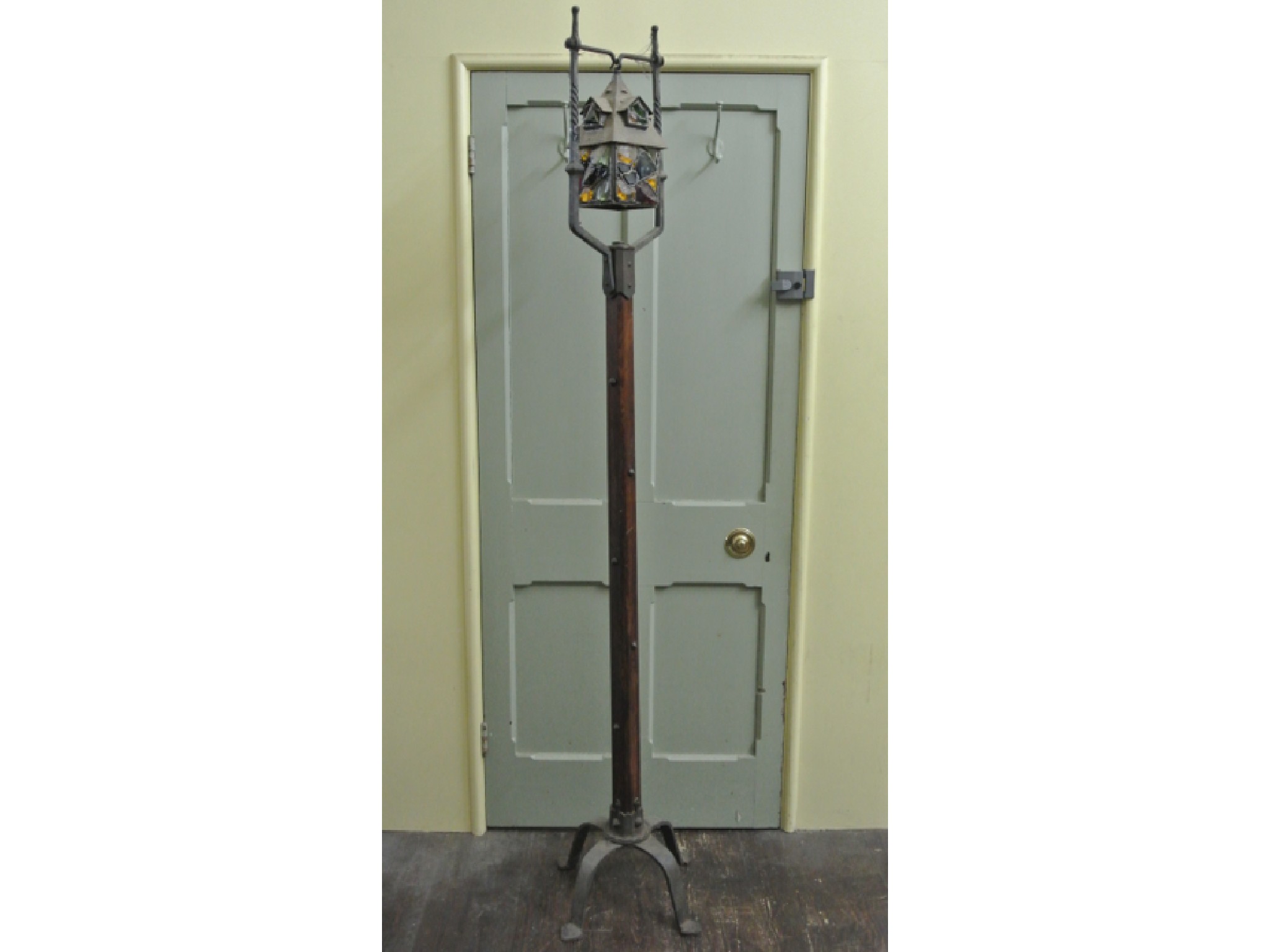 Appraisal: An Old English Arts and Crafts style standard lamp with