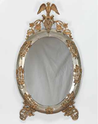 Appraisal: Oval Mirror with Silver Metal Frame Cast Brass Ornamentation Oval