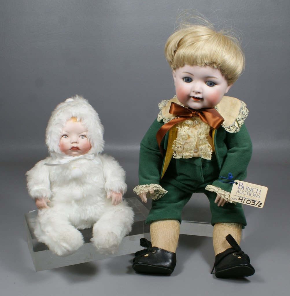 Appraisal: Reproduction German Bisque Baby Dolls the larger is an all