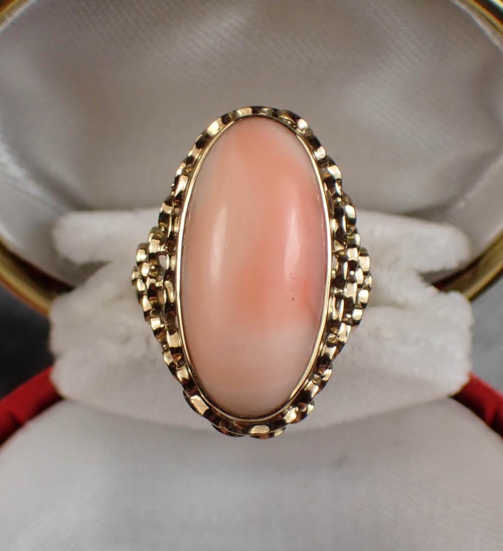 Appraisal: PINK CORAL AND FOURTEEN KARAT GOLD RING The k yellow