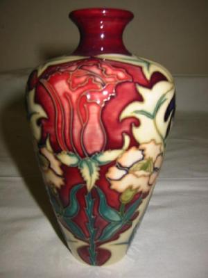 Appraisal: A MOORCROFT POTTERY VASE of inverted baluster form tube lined