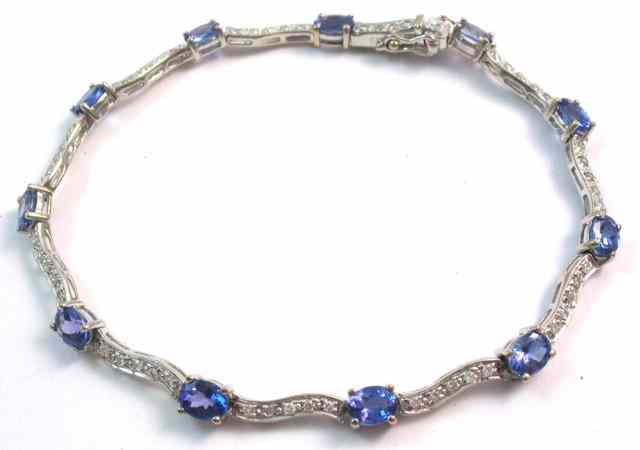 Appraisal: TANZANITE AND DIAMOND BRACELET k white gold set with eleven