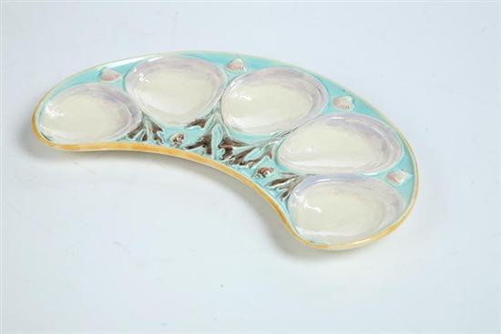 Appraisal: MAJOLICA OYSTER PLATE English nd half- th century Scarce crescent