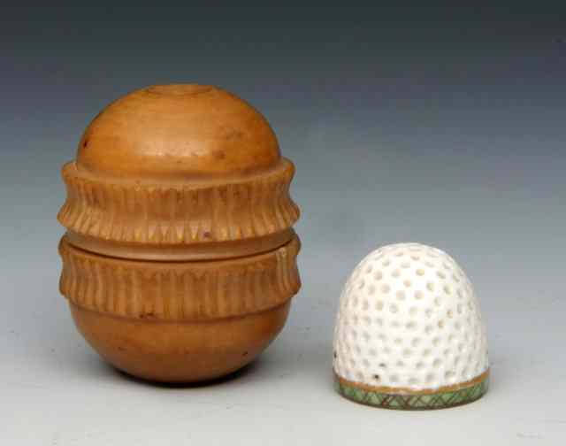 Appraisal: AN ANTIQUE FRENCH PORCELAIN THIMBLE with green enamel decoration within