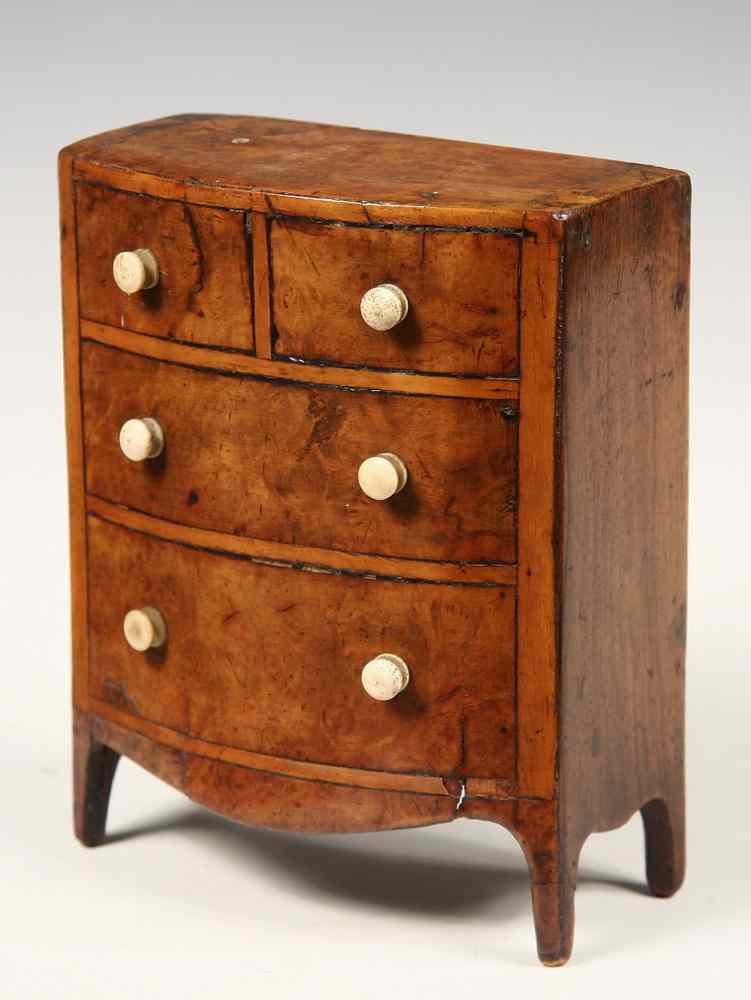 Appraisal: FURNITURE BANK - th c Miniature Bow Front Chest in