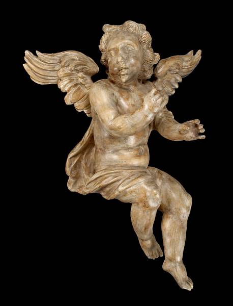 Appraisal: A Continental painted and carved figure of a putto th