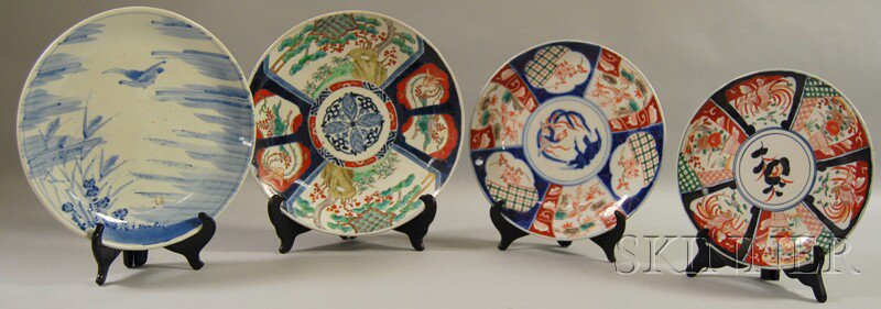 Appraisal: Four Porcelain Chargers three Imari-decorated one with blue and white