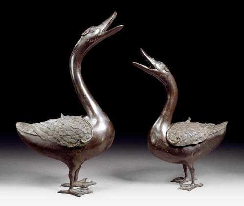 Appraisal: TWO QUACKING GEESE Japan th century H and cm Dark