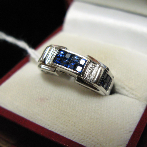 Appraisal: DIAMOND BLUE SAPPHIRE AND EIGHTEEN KARAT WHITE GOLD RING set