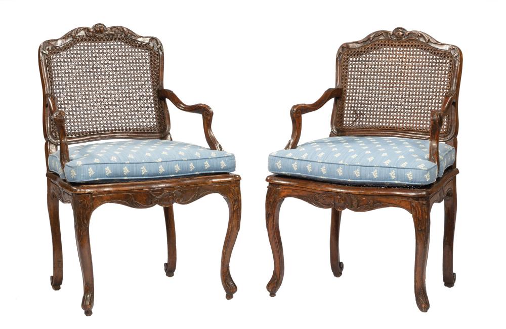 Appraisal: Pair of R gence-Style Carved Walnut Fauteuils th c foliate