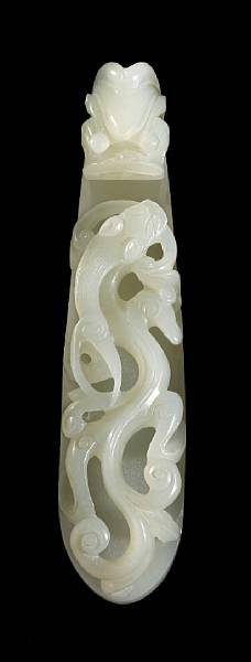 Appraisal: A white jade belt hook With a dragon head terminus