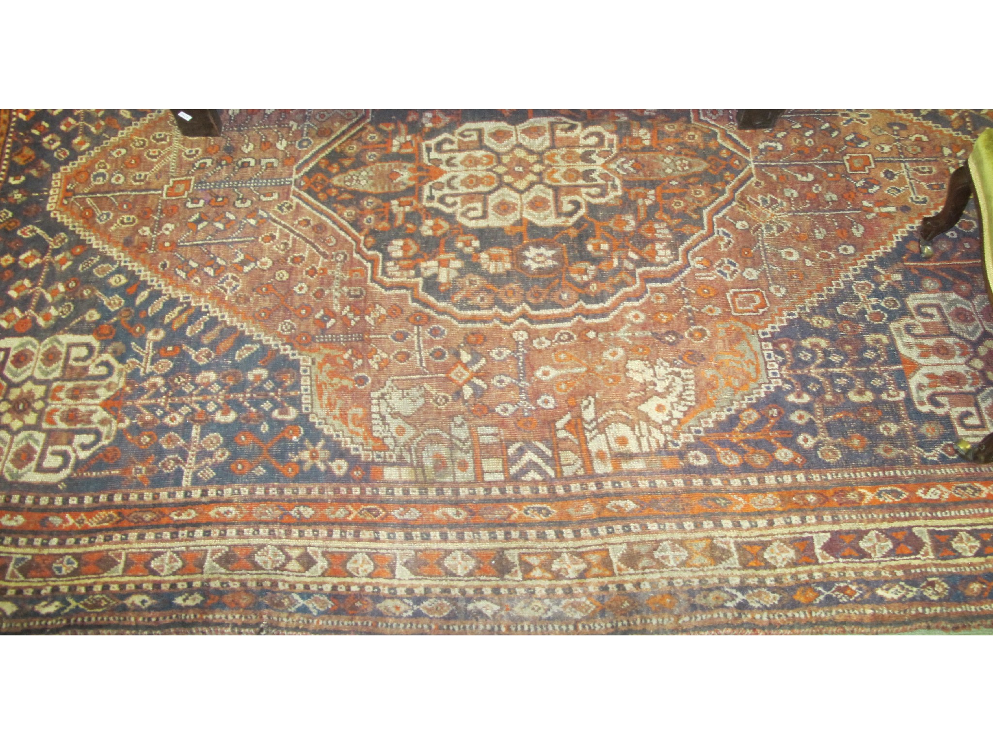 Appraisal: An Eastern rug on blue and orange ground x cm