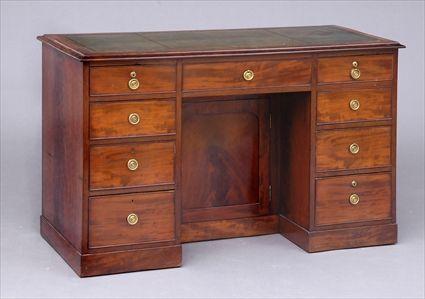 Appraisal: MAHOGANY VICTORIAN KNEEHOLE DESK The narrow rectangular top with gold