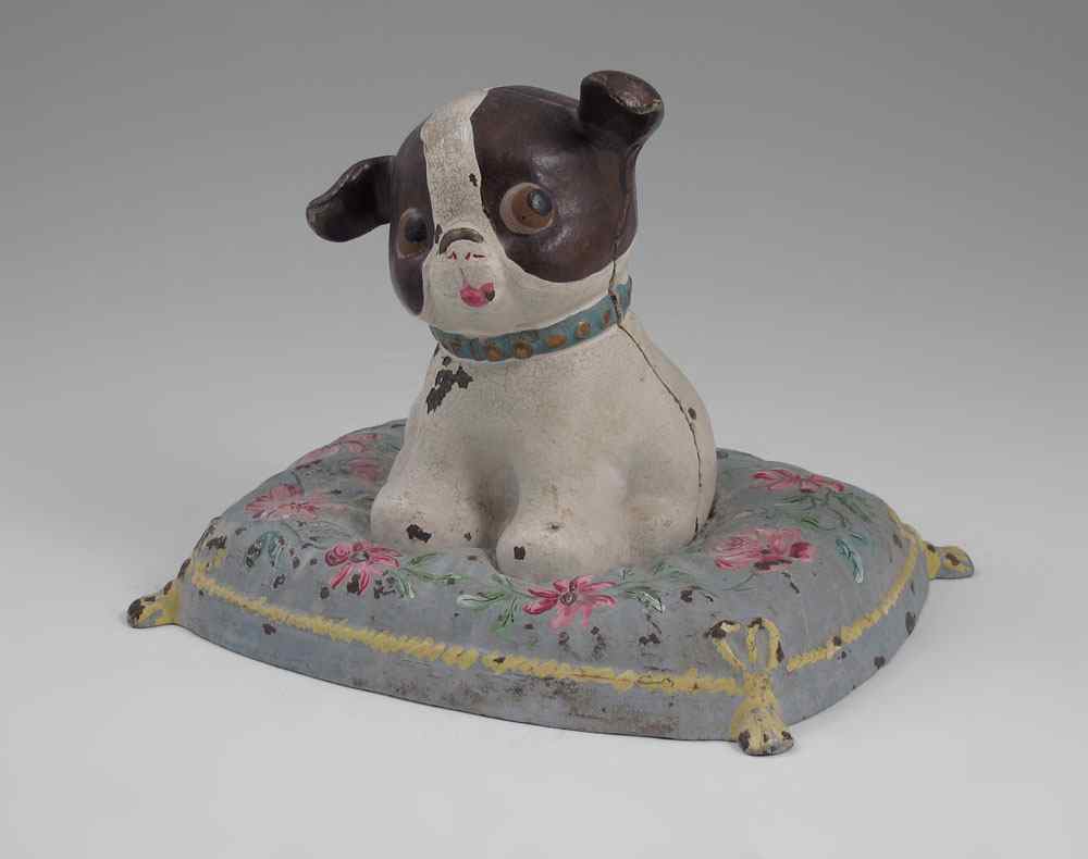 Appraisal: HUBLEY FIDO DOG ON PILLOW DOORSTOP Whimsical expression on dog's