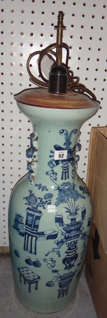 Appraisal: A large Oriental blue and white vase fitted as a