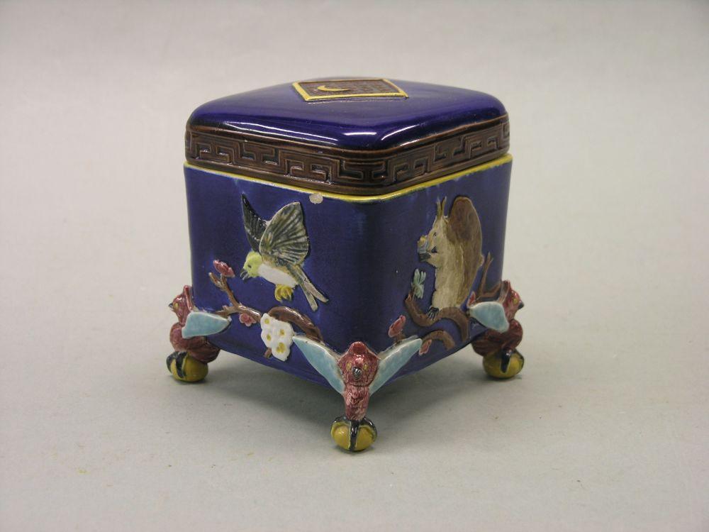 Appraisal: A Victorian Joseph Holdcroft majolica box and cover the sides